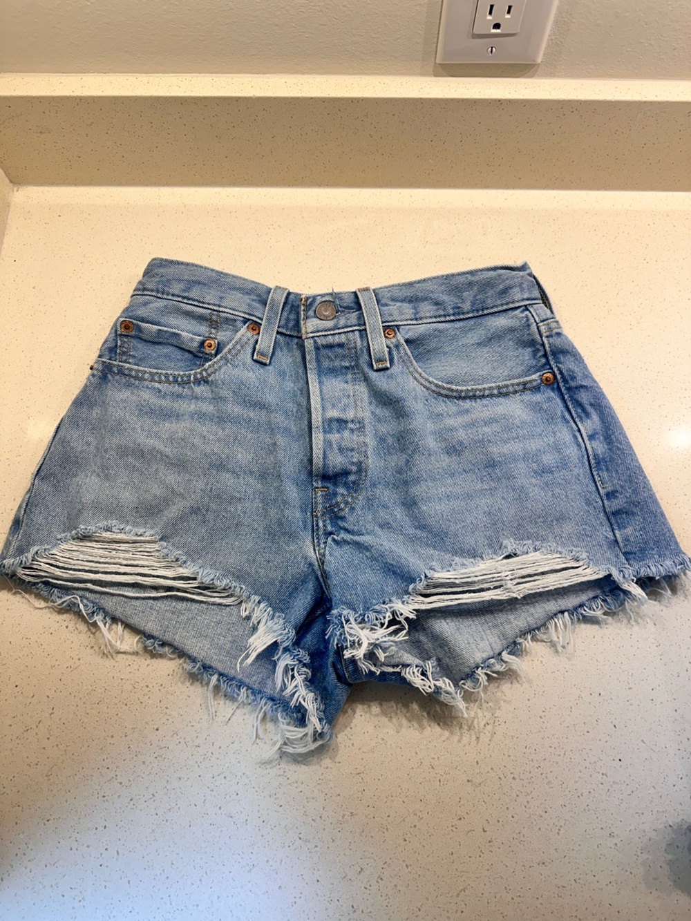 Levi's Light Wash Distressed Denim Cutoff Shorts